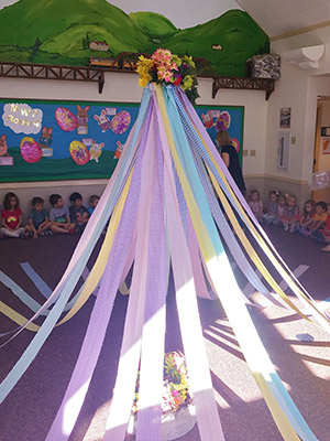 may pole with colorful streamers
